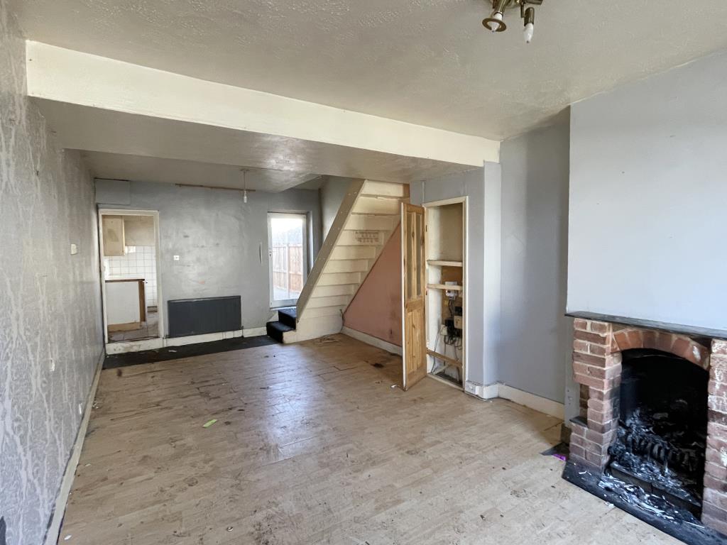 Lot: 129 - HOUSE FOR REFURBISHMENT - Living room and dining room of house for refurbishment